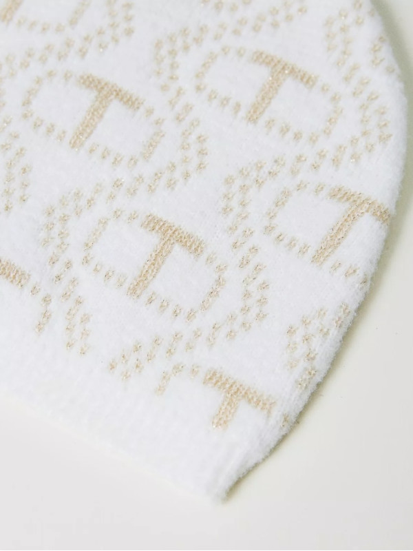 В'язана шапка/Сніг Лого