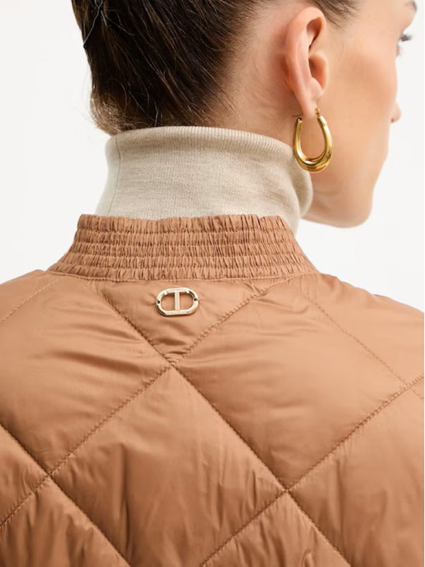 Стьобане пальто/Земля